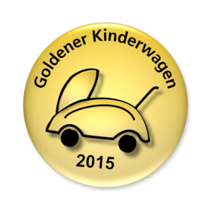 Ein goldenes, rundes Abzeichen mit einer stilisierten schwarzen Kinderwagengrafik und der Aufschrift Goldener Kinderwagen 2015.